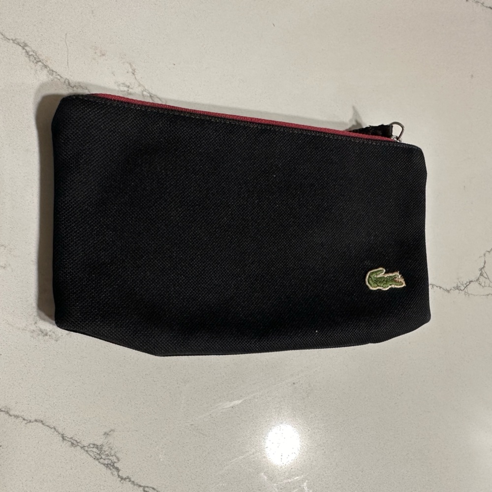 Black Lacoste wristlet